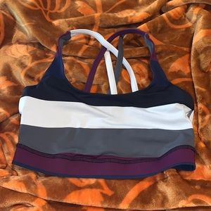 Navy, grey, purple, and white energy bra